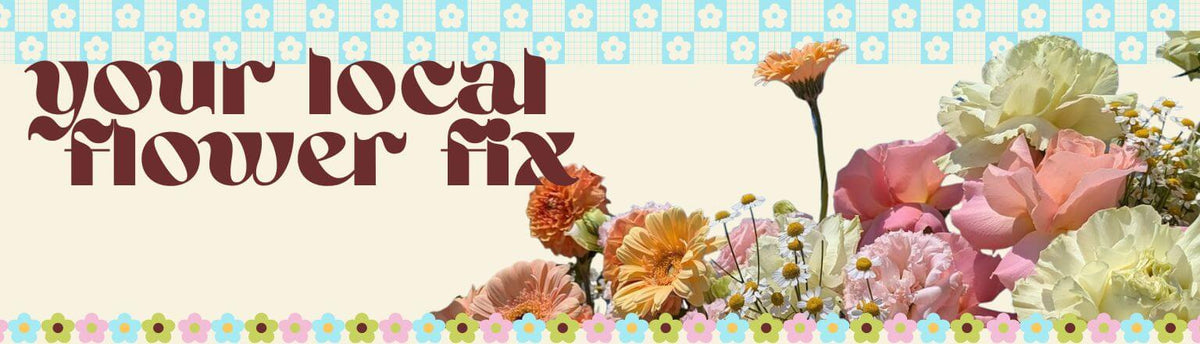 A decorative banner-style graphic with the text 'your local flower fix' in dark brown lettering, a cream background, floral illustrations, and a blue-and-white patterned border at the top and bottom. Featuring pink, yellow, peach, white, small and large flowers